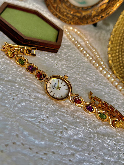 1pc New High-End Luxury Women's Watch Embedded With Colorful Tourmalines, Diamonds And An Oval Shaped Mother Of Pearl Dial.